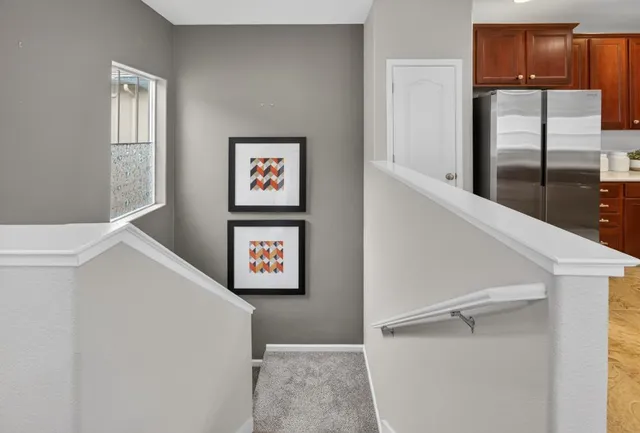 a view of a hallway with workspace