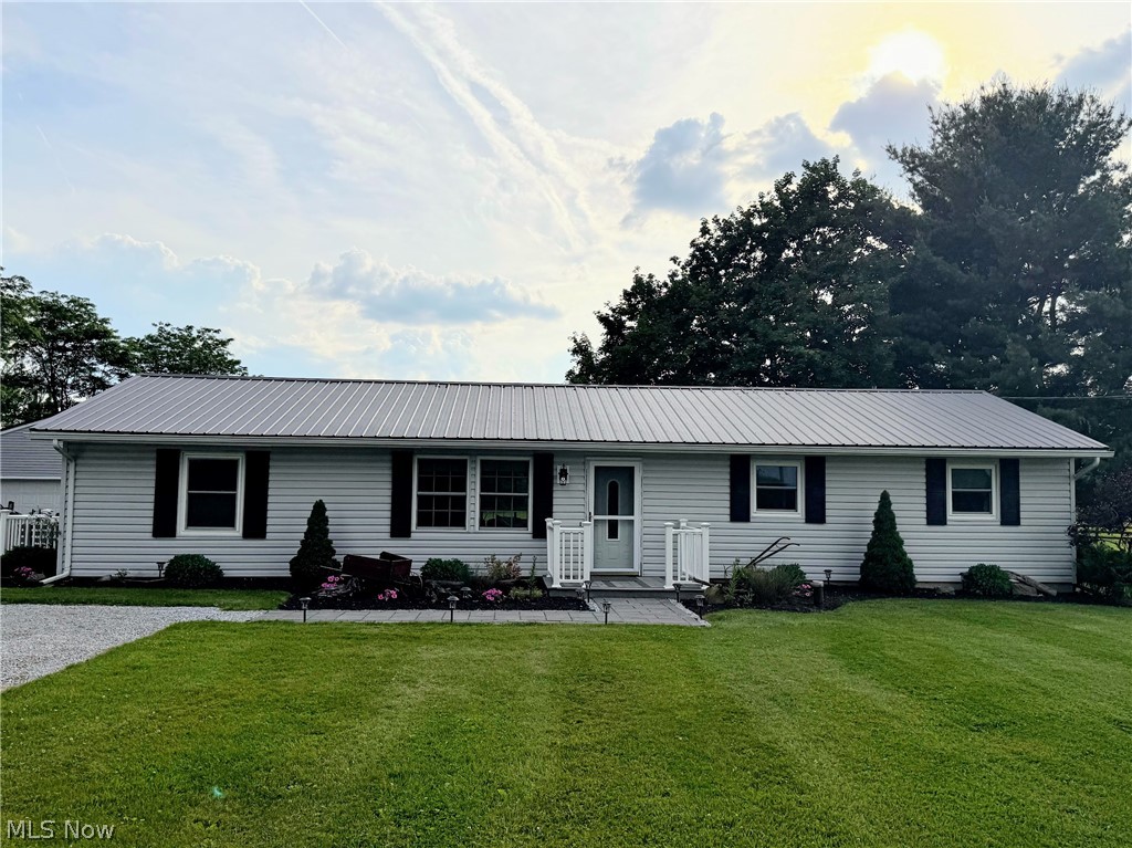 15344 Eby Road Seville, OH 44273 - Photo 1 of 1 Ranch-style home with a front lawn