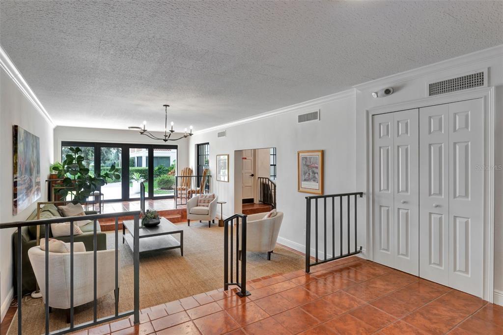 100 South Interlachen Avenue, Unit 410F Winter Park, FL 32789 - Photo 32 of 38 a view of a livingroom with furniture and floor to ceiling window