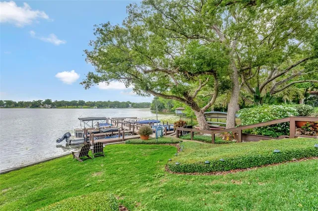 a garden view with a seating space and a bench