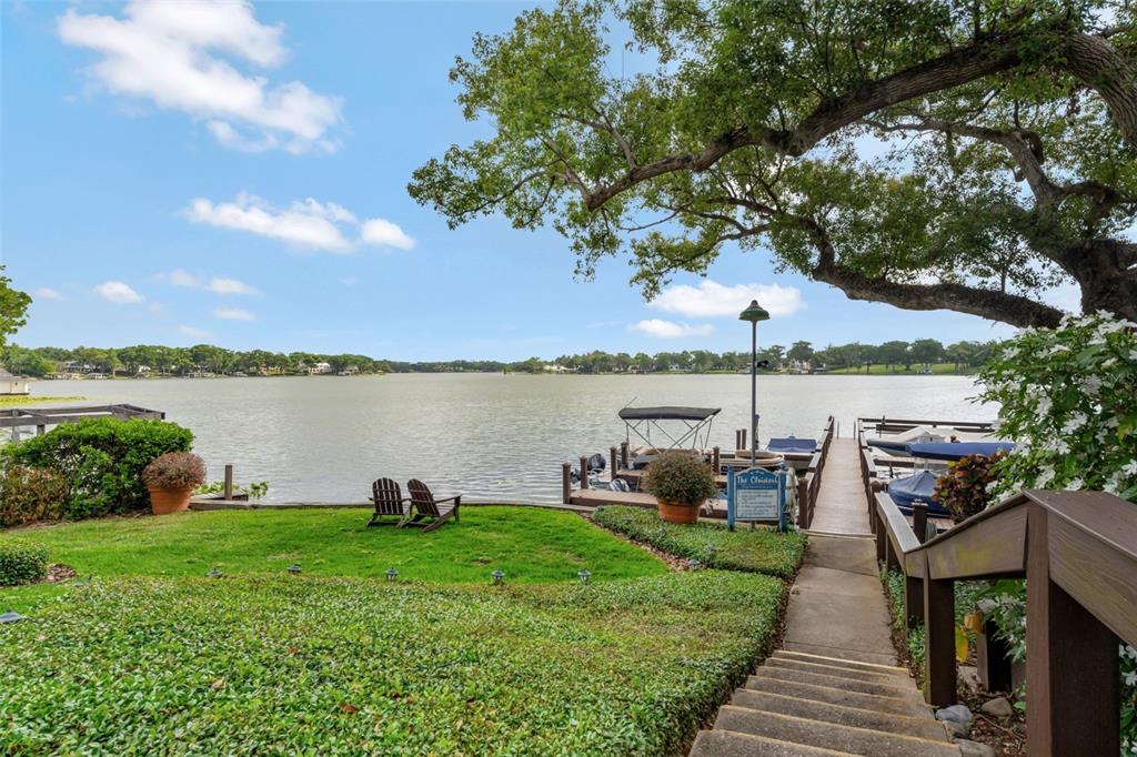 100 South Interlachen Avenue, Unit 410F Winter Park, FL 32789 - Photo 36 of 38 a lake with houses in back