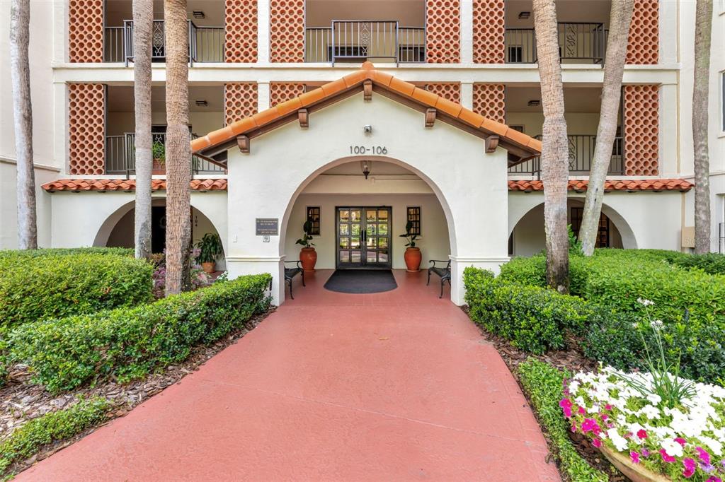 100 South Interlachen Avenue, Unit 410F Winter Park, FL 32789 - Photo 7 of 38 a front view of a house with garden