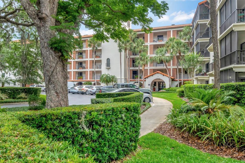 100 South Interlachen Avenue, Unit 410F Winter Park, FL 32789 - Photo 8 of 38 a house view with a garden space