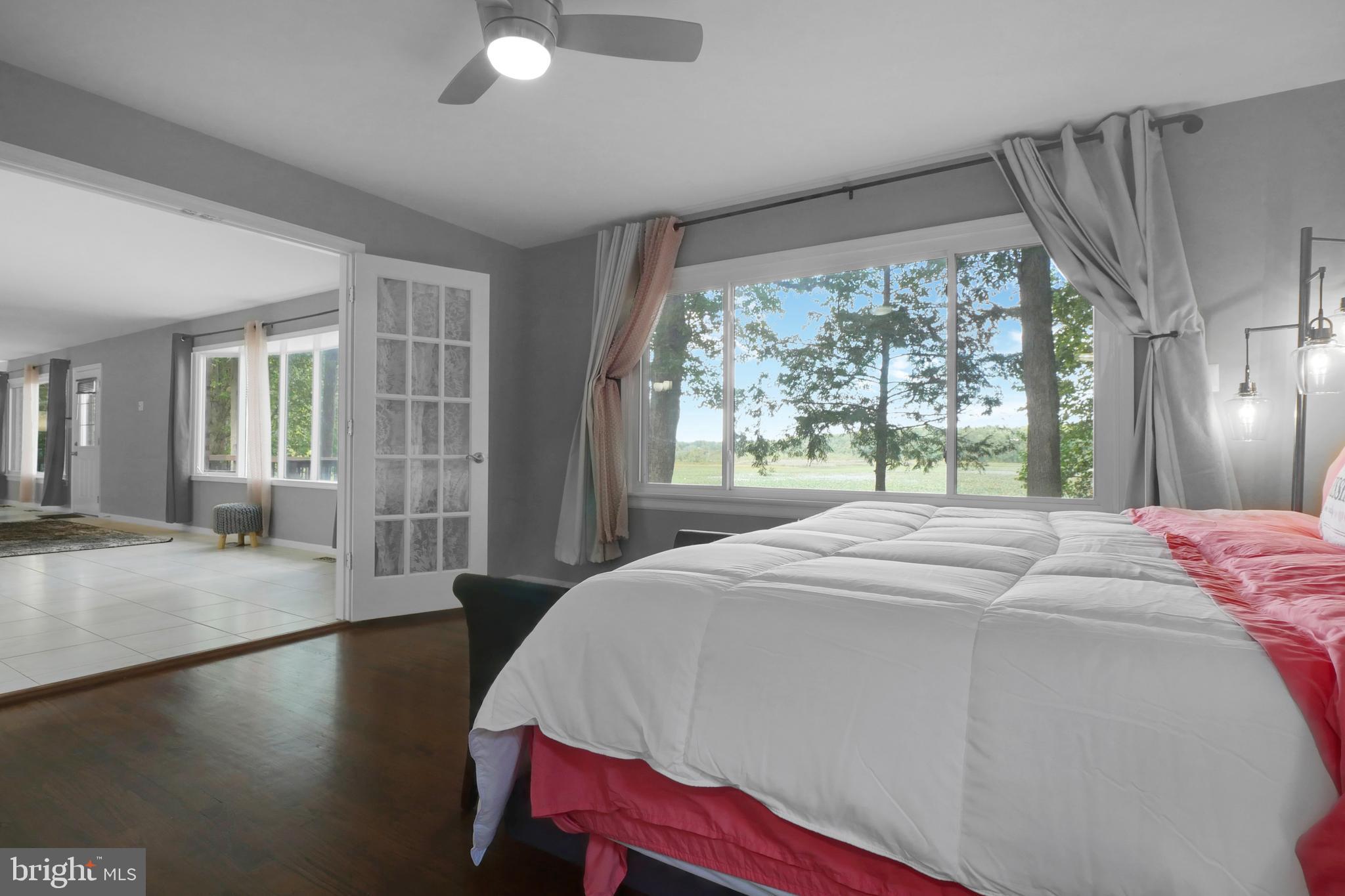 3223 Riverview Drive Triangle, VA 22172 - Photo 23 of 81 Main Level Primary Bedroom Suite w/Water Views