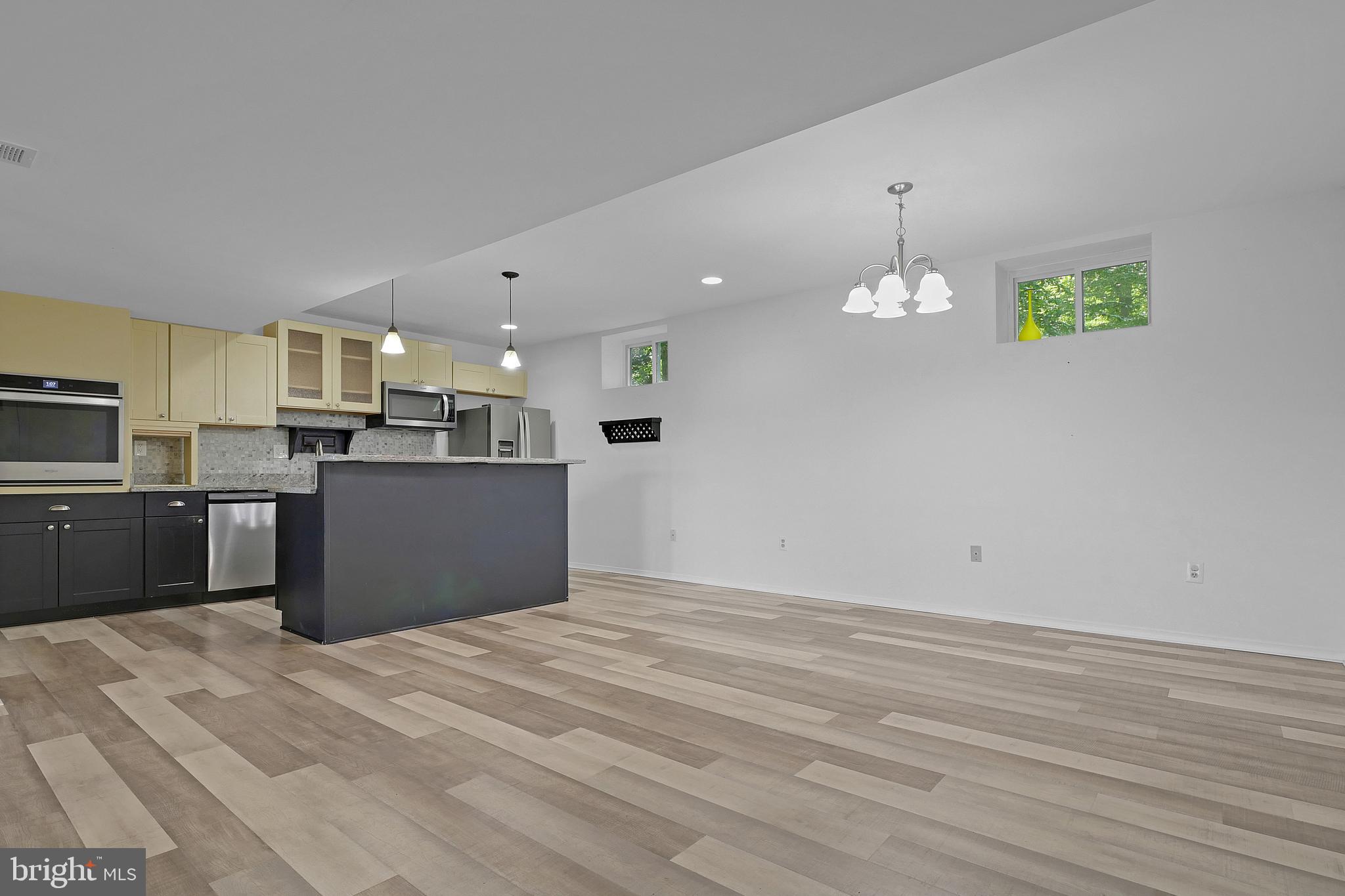 3223 Riverview Drive Triangle, VA 22172 - Photo 44 of 81 Lower Level Dining Area and Kitchen