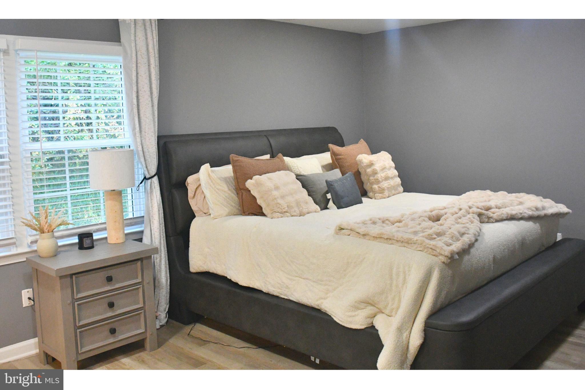 17930 Masemore Road Parkton, MD 21120 - Photo 27 of 46 a bedroom with a bed and a window