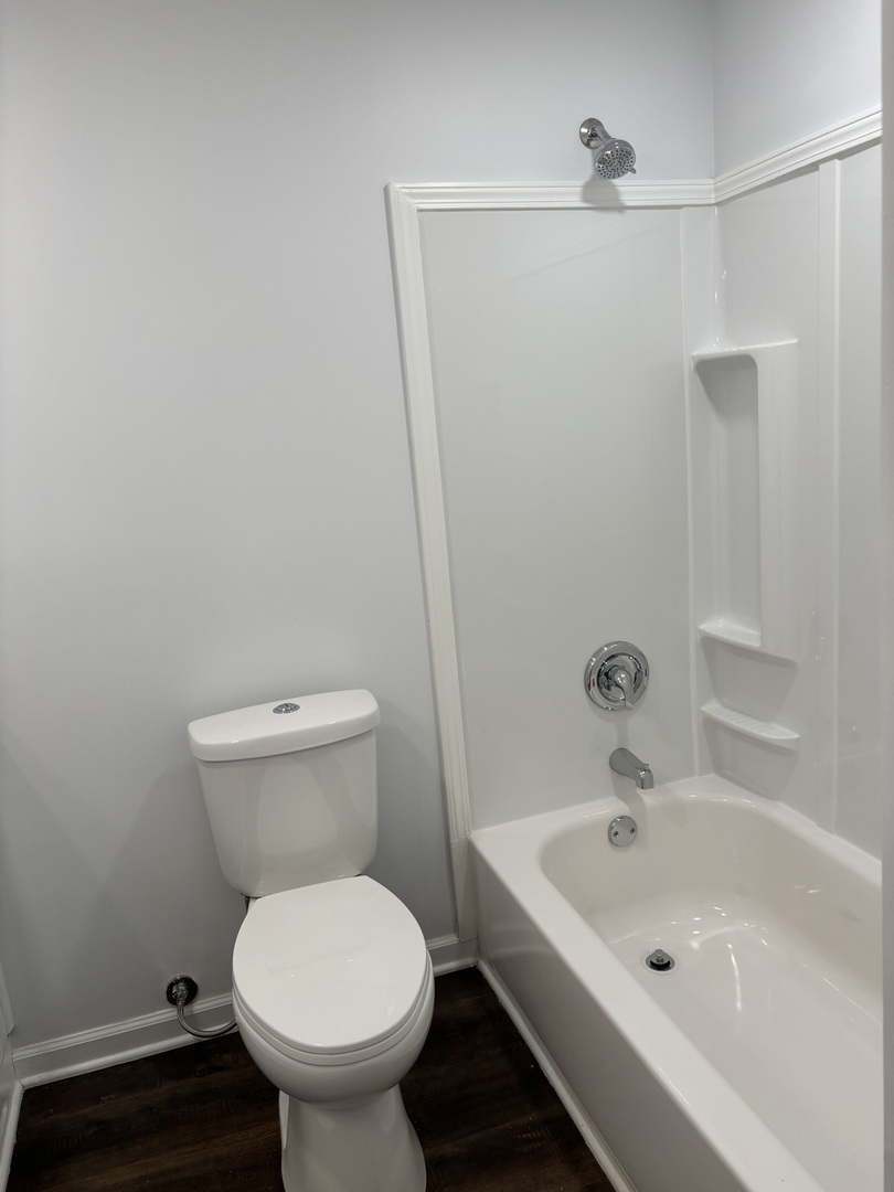 445 Lucile Avenue Elgin, IL 60120 - Photo 7 of 7 a bathroom with a sink and a toilet