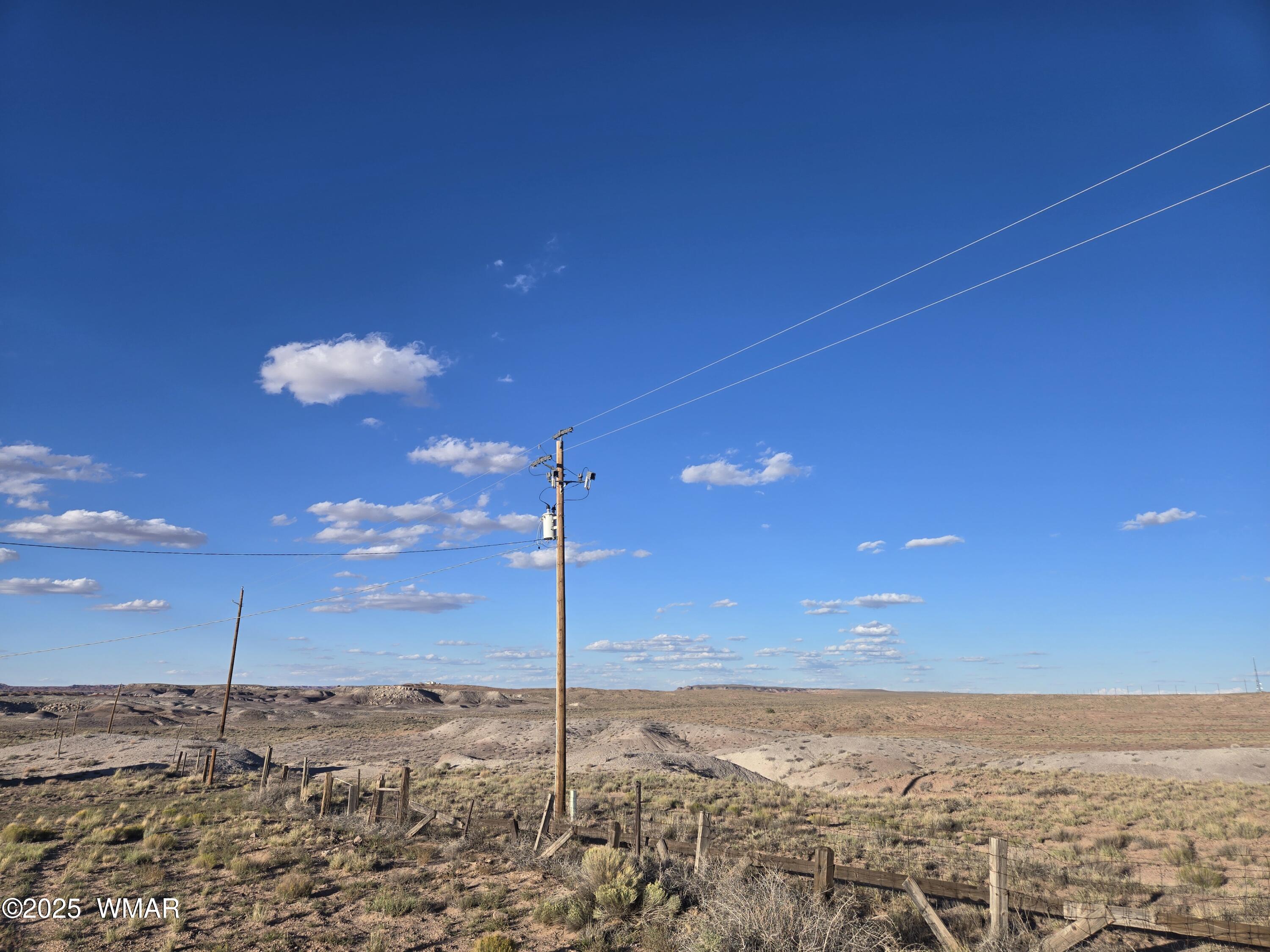 9714 Washboard Road Holbrook, AZ 86025 - Photo 4 of 9 APS Power lines running along east side of property