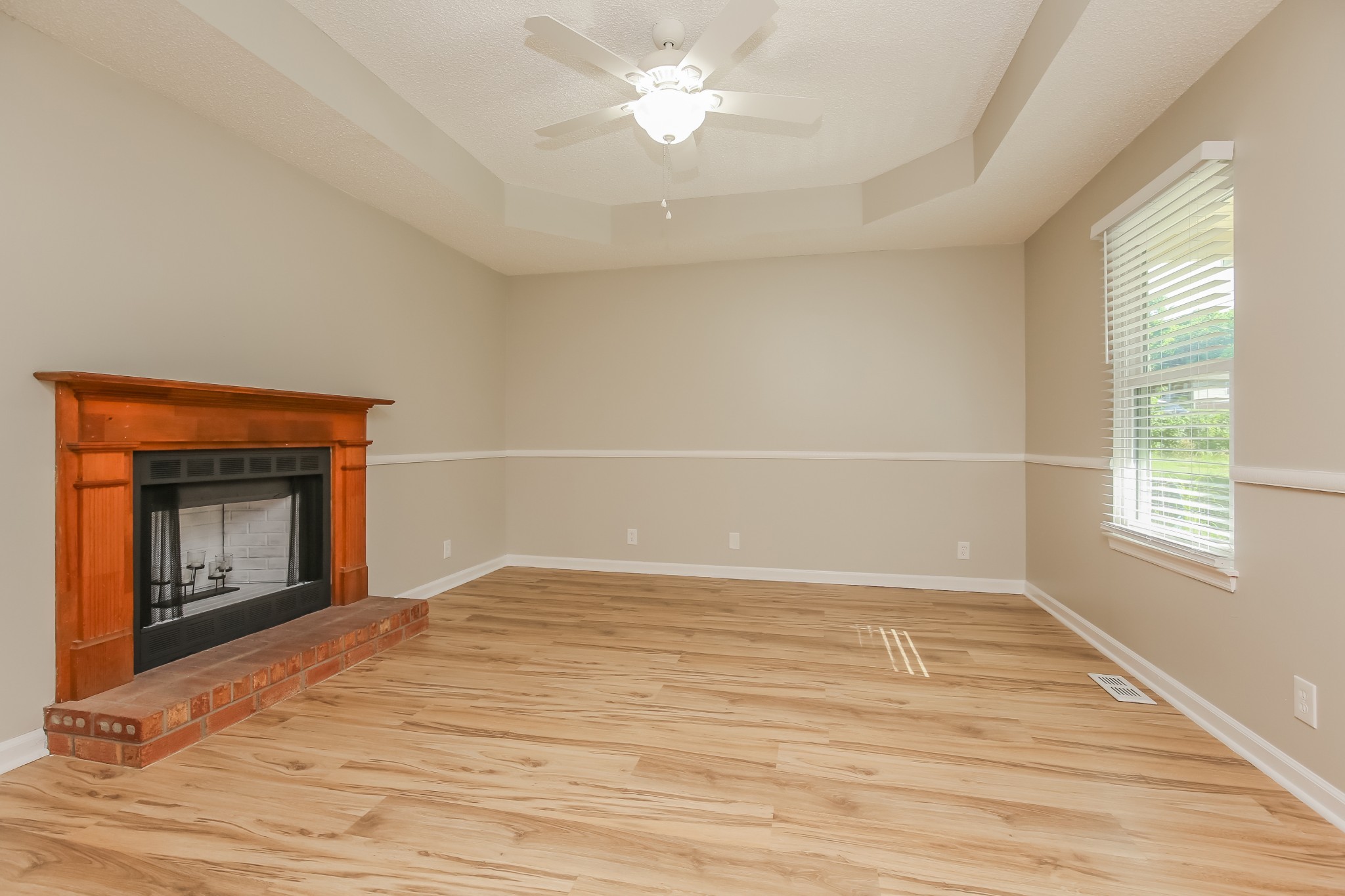1416 Mohawk Trail Madison, TN 37115 - Photo 2 of 16 a view of empty room with wooden floor and fan