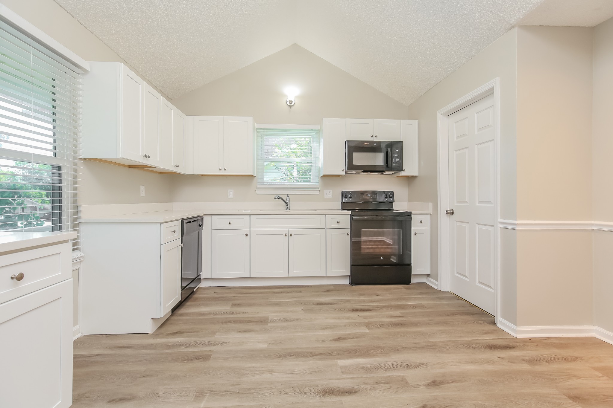 1416 Mohawk Trail Madison, TN 37115 - Photo 3 of 16 a kitchen with a stove a refrigerator and a sink