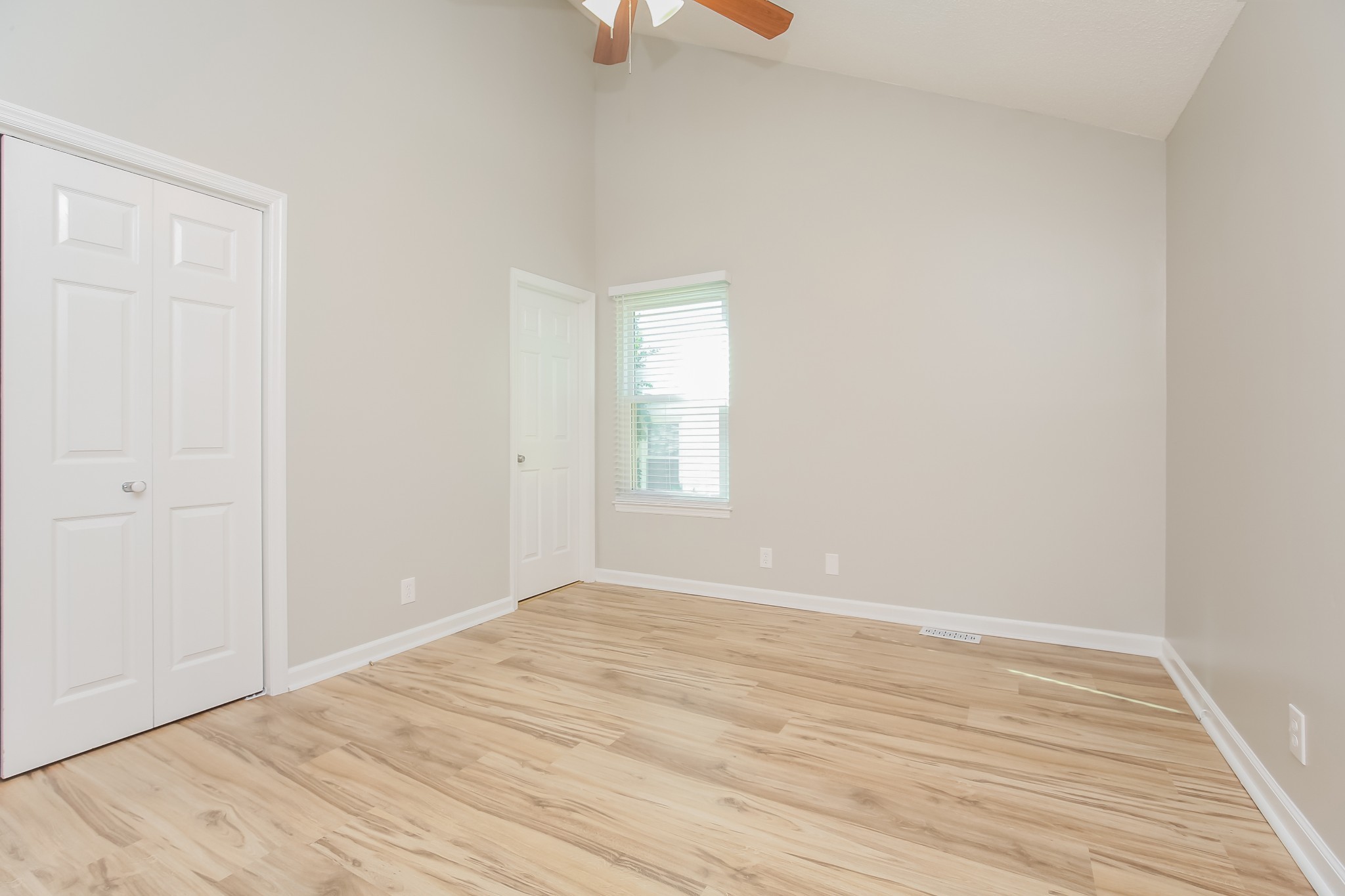 1416 Mohawk Trail Madison, TN 37115 - Photo 7 of 16 a view of an empty room with wooden floor