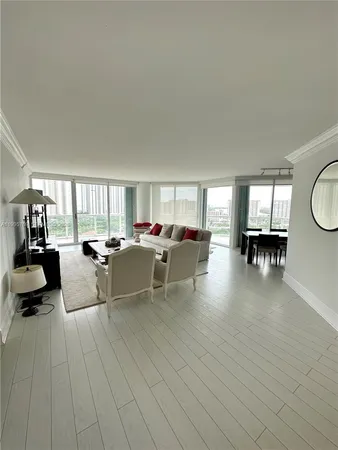 a view of balcony with furniture and city view
