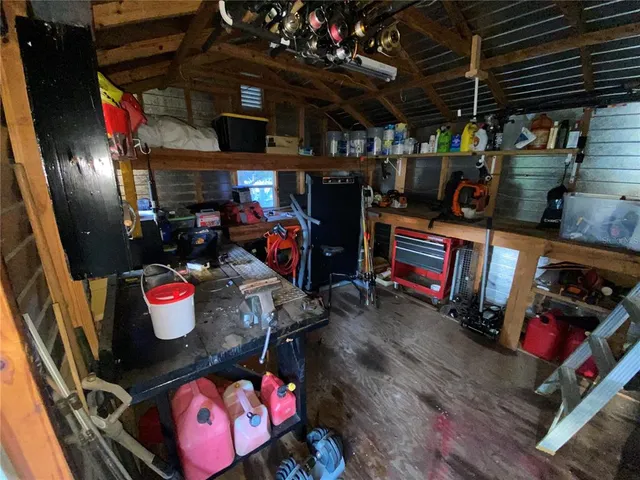 a view of yard with swimming pool and green space