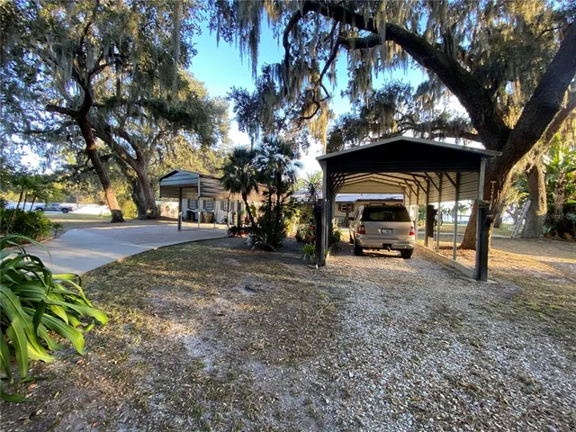 a view of street with parked cars