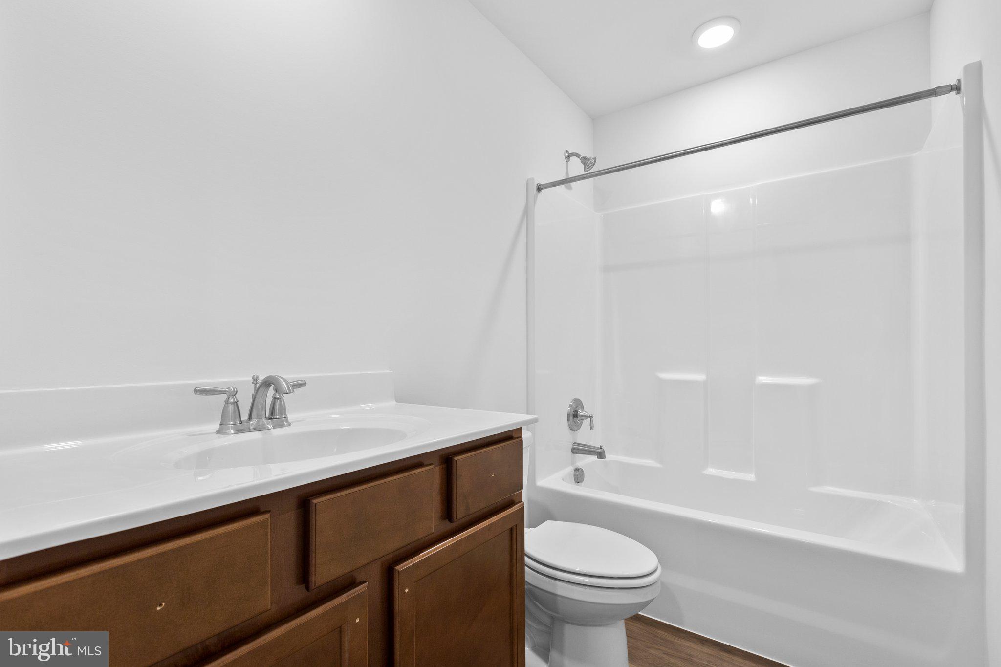 2 Indiantown Road King George, VA 22485 - Photo 17 of 27 a bathroom with a sink mirror toilet and bathtub