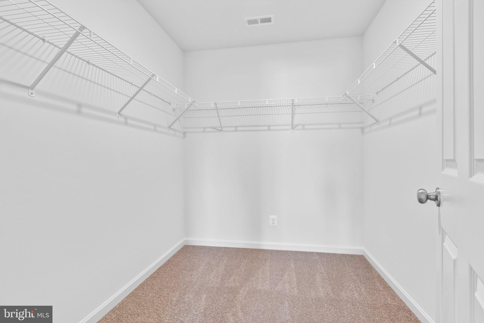 2 Indiantown Road King George, VA 22485 - Photo 18 of 27 a view of a room with racks on the wall