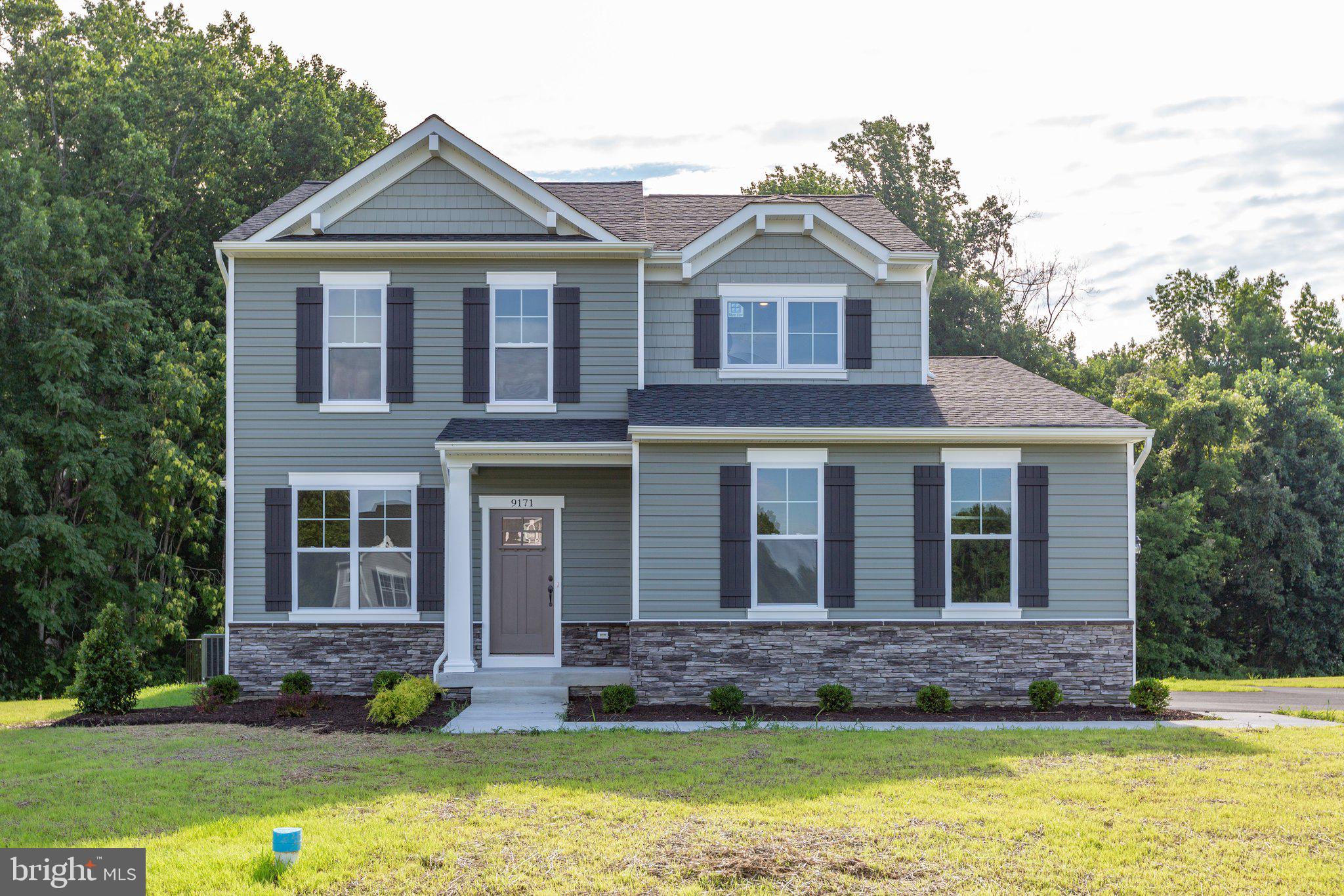 2 Indiantown Road King George, VA 22485 - Photo 2 of 27 a front view of a house with a yard