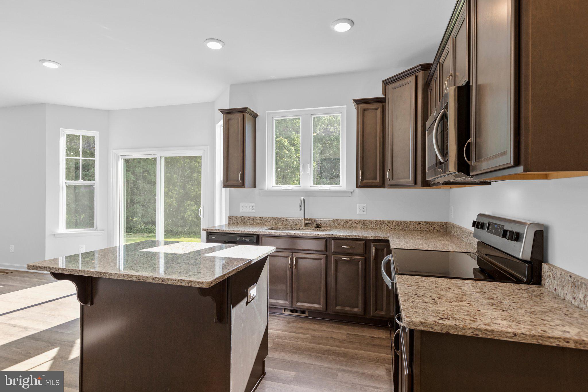 2 Indiantown Road King George, VA 22485 - Photo 5 of 27 a kitchen with a sink stove and microwave