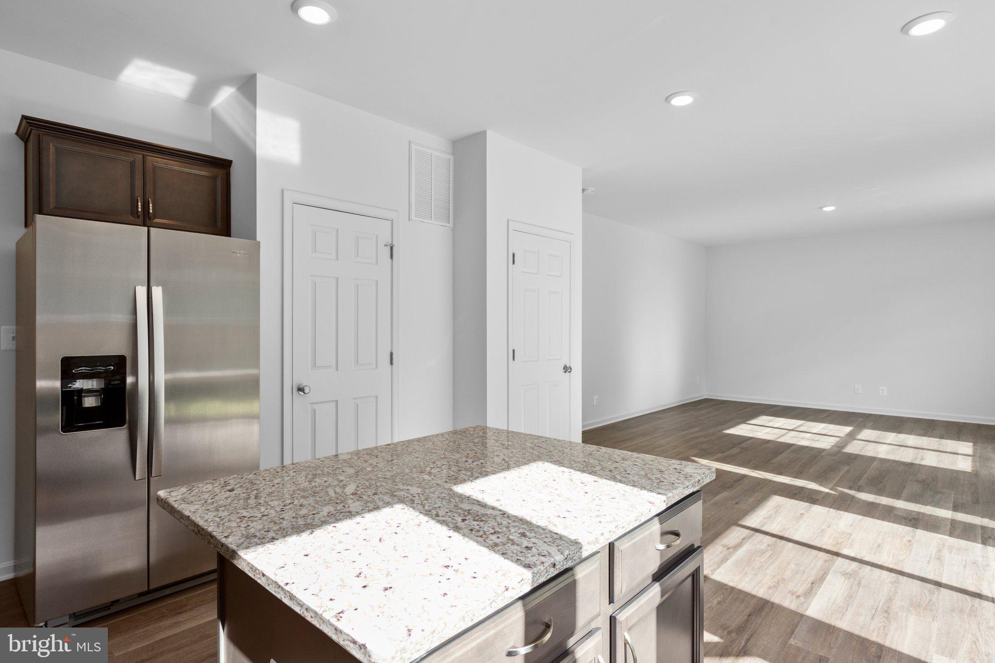 2 Indiantown Road King George, VA 22485 - Photo 6 of 27 a kitchen with a table and refrigerator