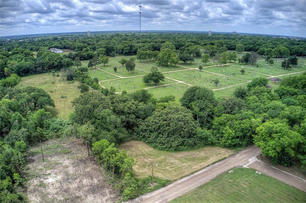 Tbd Sycamore Street Commerce, TX 75428 - Photo 2 of 11 a view of a big yard with large trees
