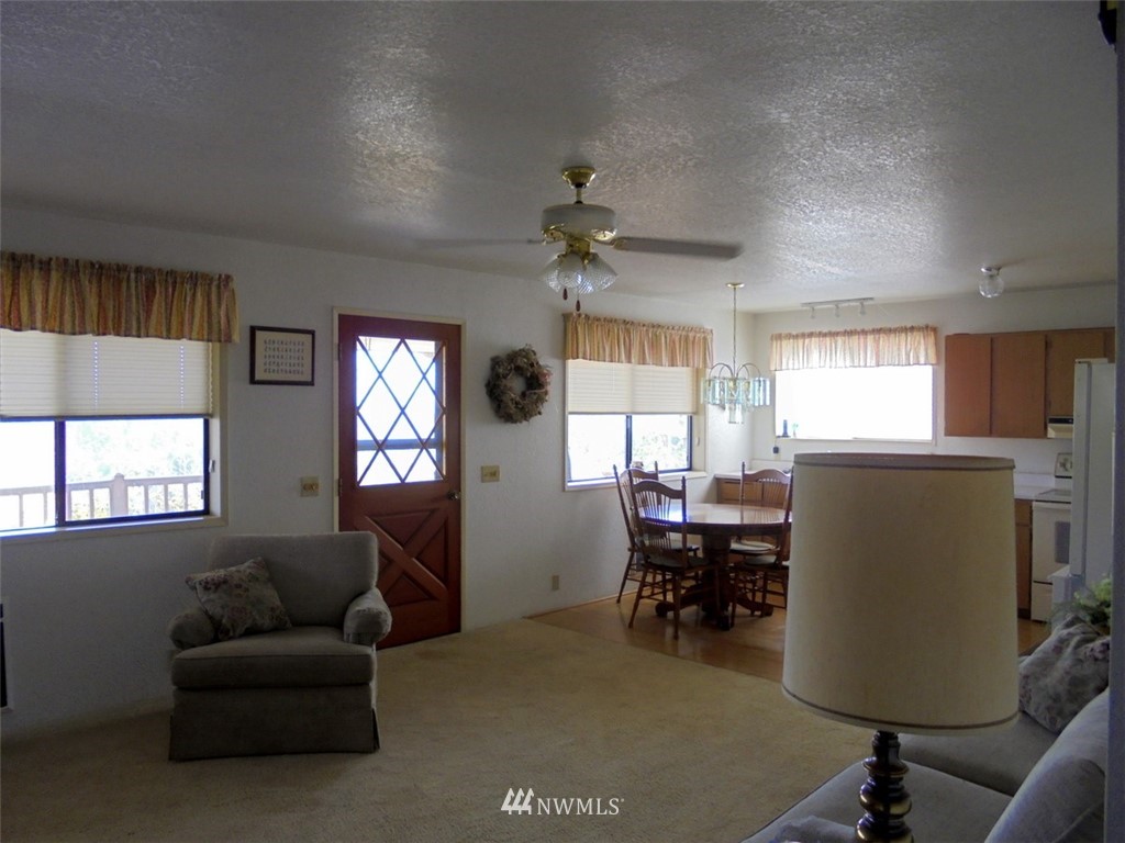 803 Twisp Carlton Road, Unit B Twisp, WA 98856 - Photo 9 of 25 a living room with furniture and a window