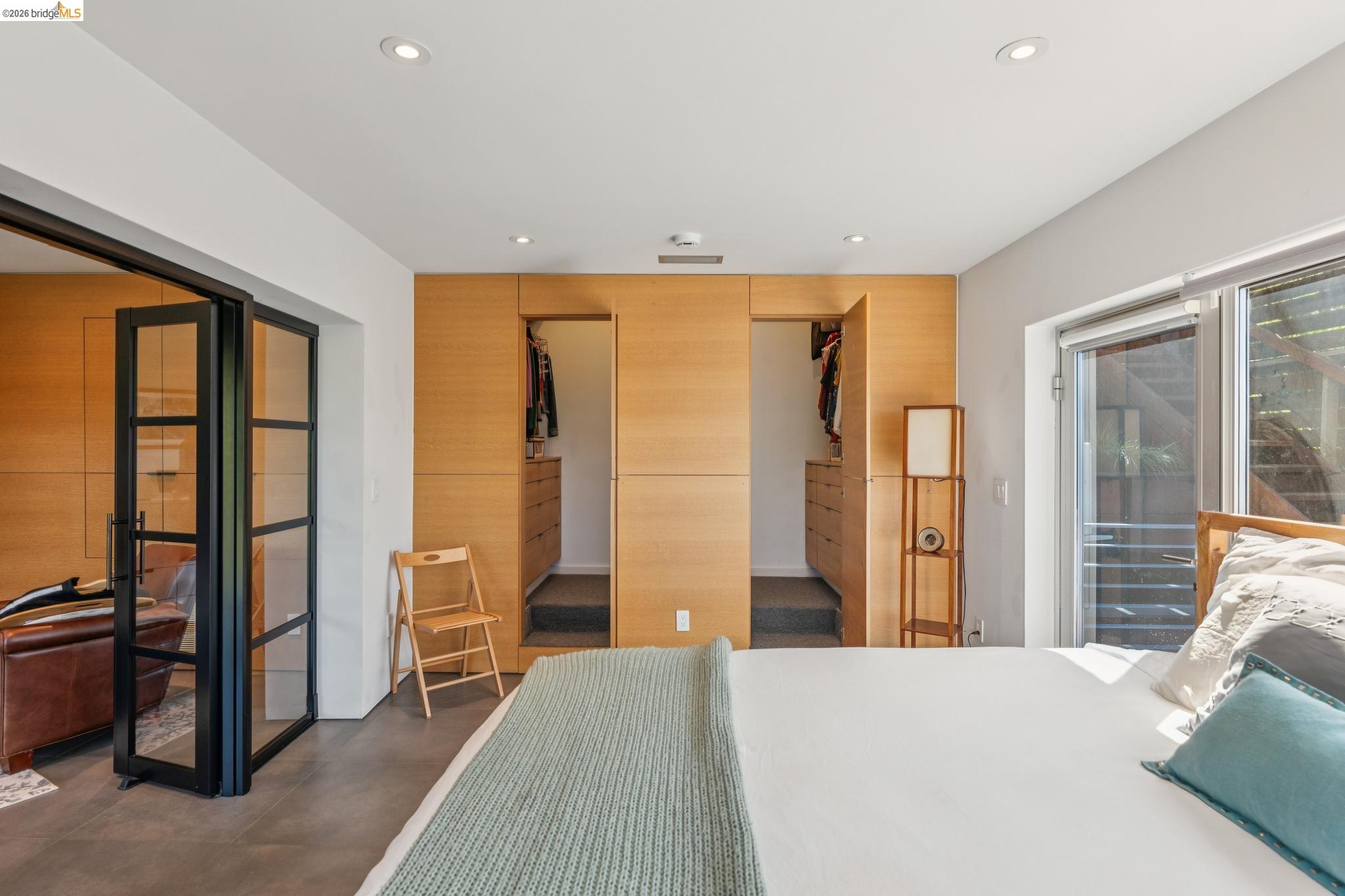 6733 Snake Road Oakland, CA 94611 - Photo 30 of 57 Bedroom featuring a spacious hidden walk-in closet