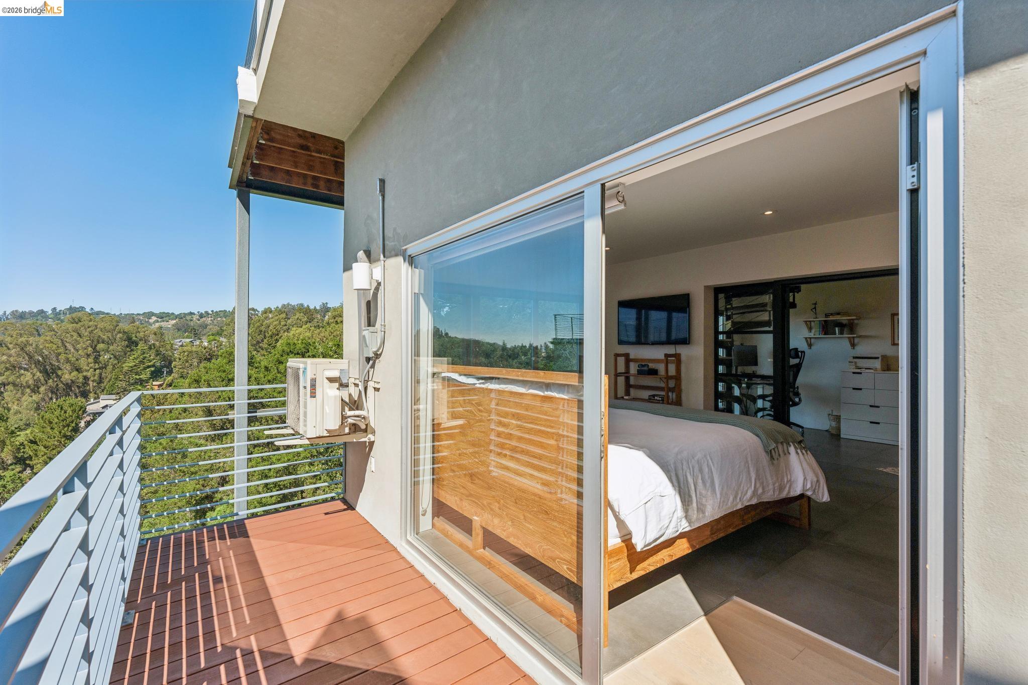 6733 Snake Road Oakland, CA 94611 - Photo 33 of 57 Private deck off primary bedroom with views