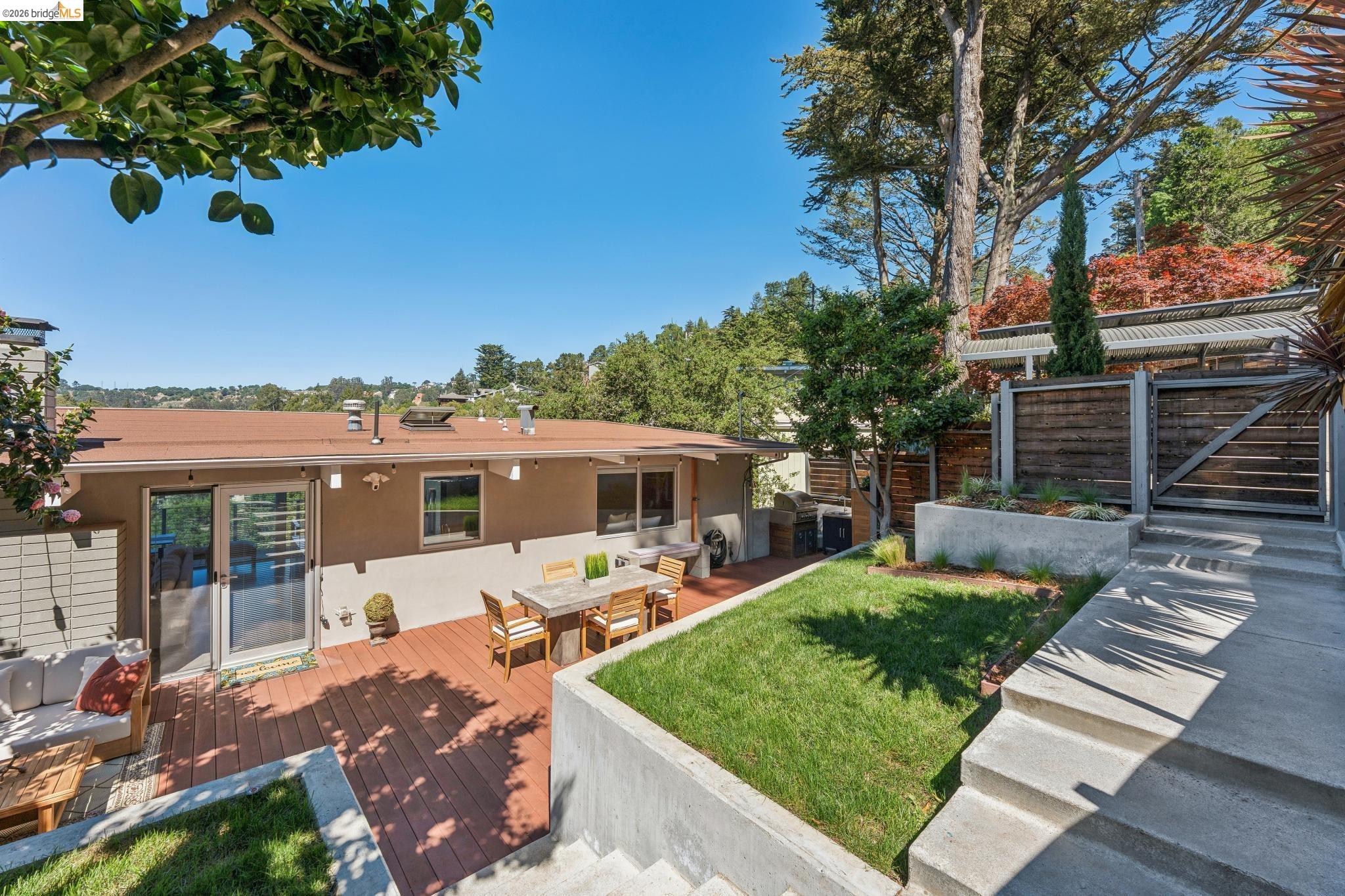 6733 Snake Road Oakland, CA 94611 - Photo 48 of 57 front view of a house with a patio