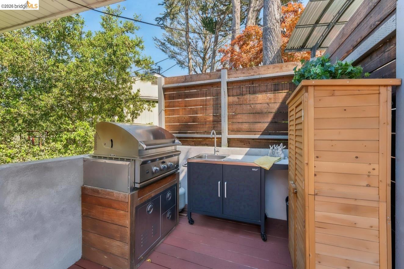 6733 Snake Road Oakland, CA 94611 - Photo 51 of 57 Dedicated outdoor kitchen area with prep area and a premium 30" DCS grill (est. value $3500-4500).