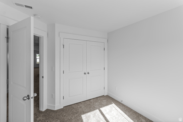 2995 South 265th Street West, Unit 752 Logan, UT 84321 - Photo 13 of 21 Neutral tone walls complement the carpeted flooring