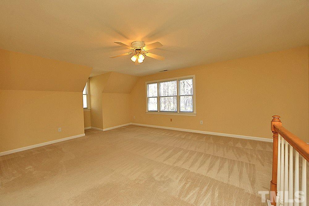 402 Lookout Point Rougemont, NC 27572 - Photo 22 of 30 an empty room with windows and fan