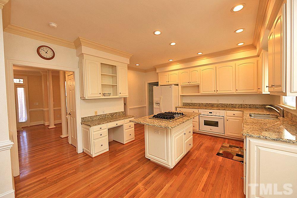 402 Lookout Point Rougemont, NC 27572 - Photo 8 of 30 a kitchen with stainless steel appliances granite countertop a stove and a sink