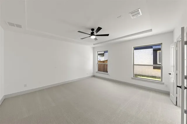a kitchen with wooden cabinets and sink