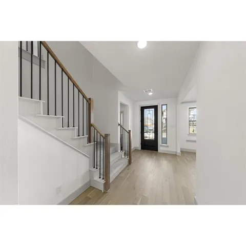 a view interior of a house with wooden floor and windows
