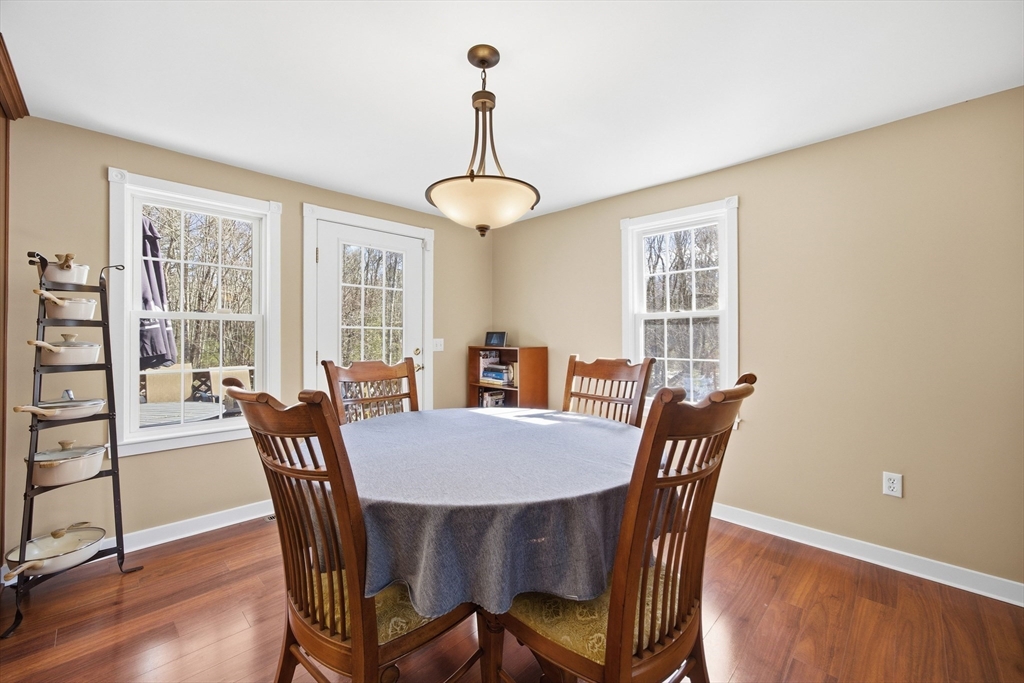 200 Nashua Road Groton, MA 01450 - Photo 18 of 41 a view of a dining room with furniture window and wooden floor