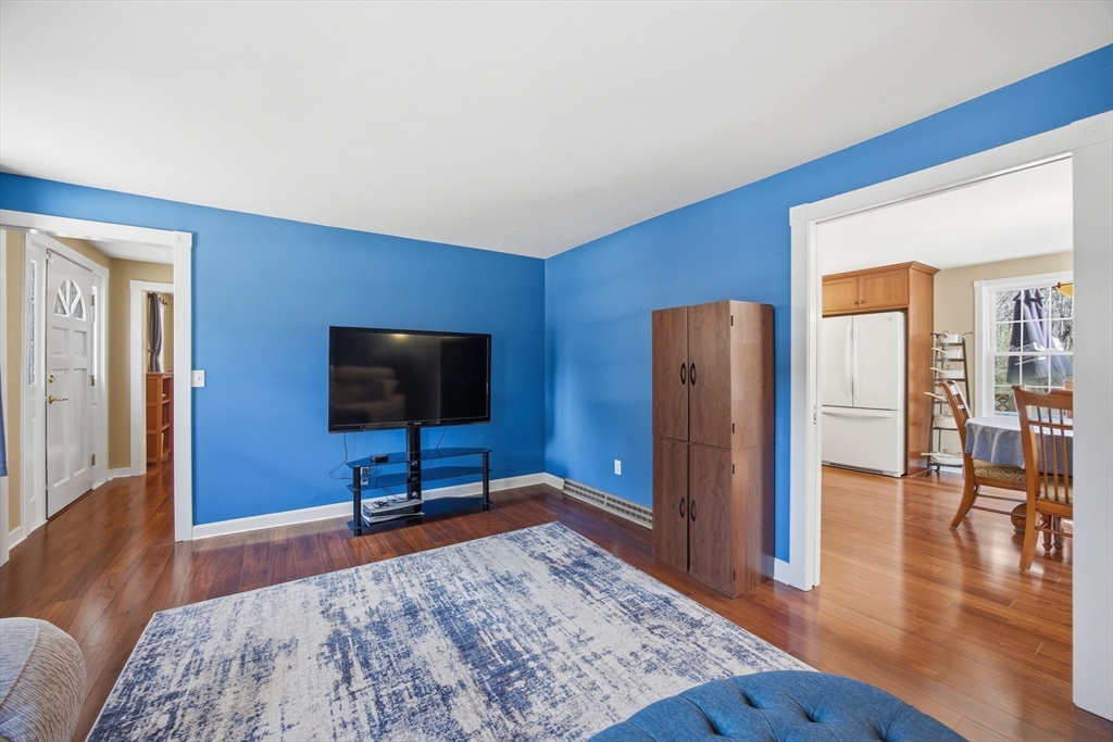 200 Nashua Road Groton, MA 01450 - Photo 21 of 41 a living room with furniture and a flat screen tv