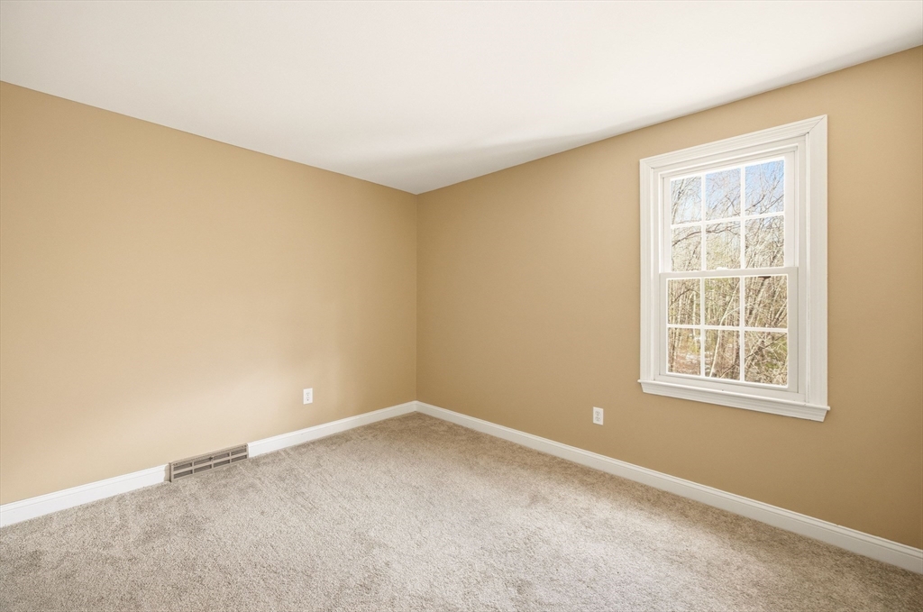 200 Nashua Road Groton, MA 01450 - Photo 31 of 41 an empty room with a window