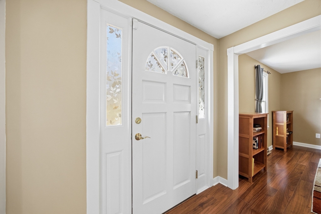 200 Nashua Road Groton, MA 01450 - Photo 10 of 41 a view of a hallway with wooden floor and closet