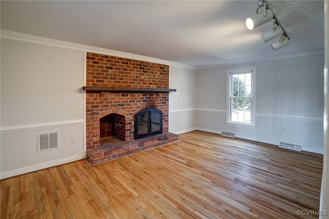 13401 Glendower Road Midlothian, VA 23113 - Photo 25 of 41 Wood burning fireplace is focal point of large Fam