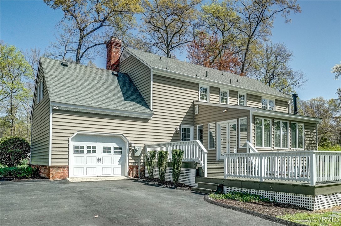 13401 Glendower Road Midlothian, VA 23113 - Photo 3 of 41 Large garage with lots of cabinets and utility sin