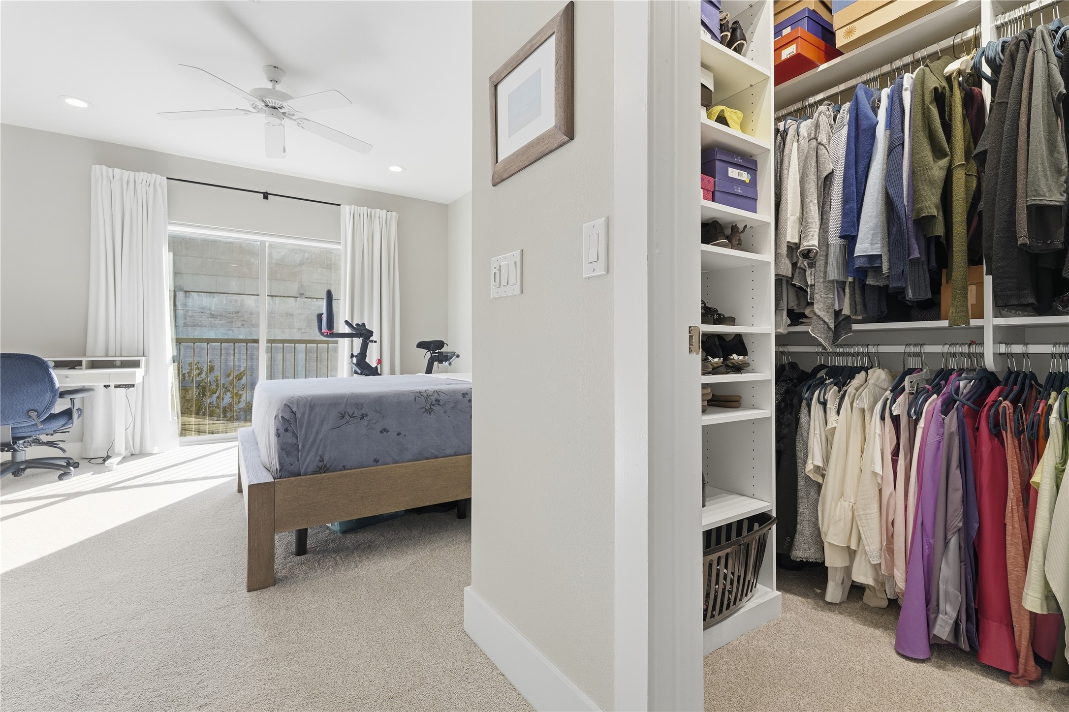 908 Nueces Street, Unit 31 Austin, TX 78701 - Photo 26 of 32 a view of walk in closet with clothes and shoes