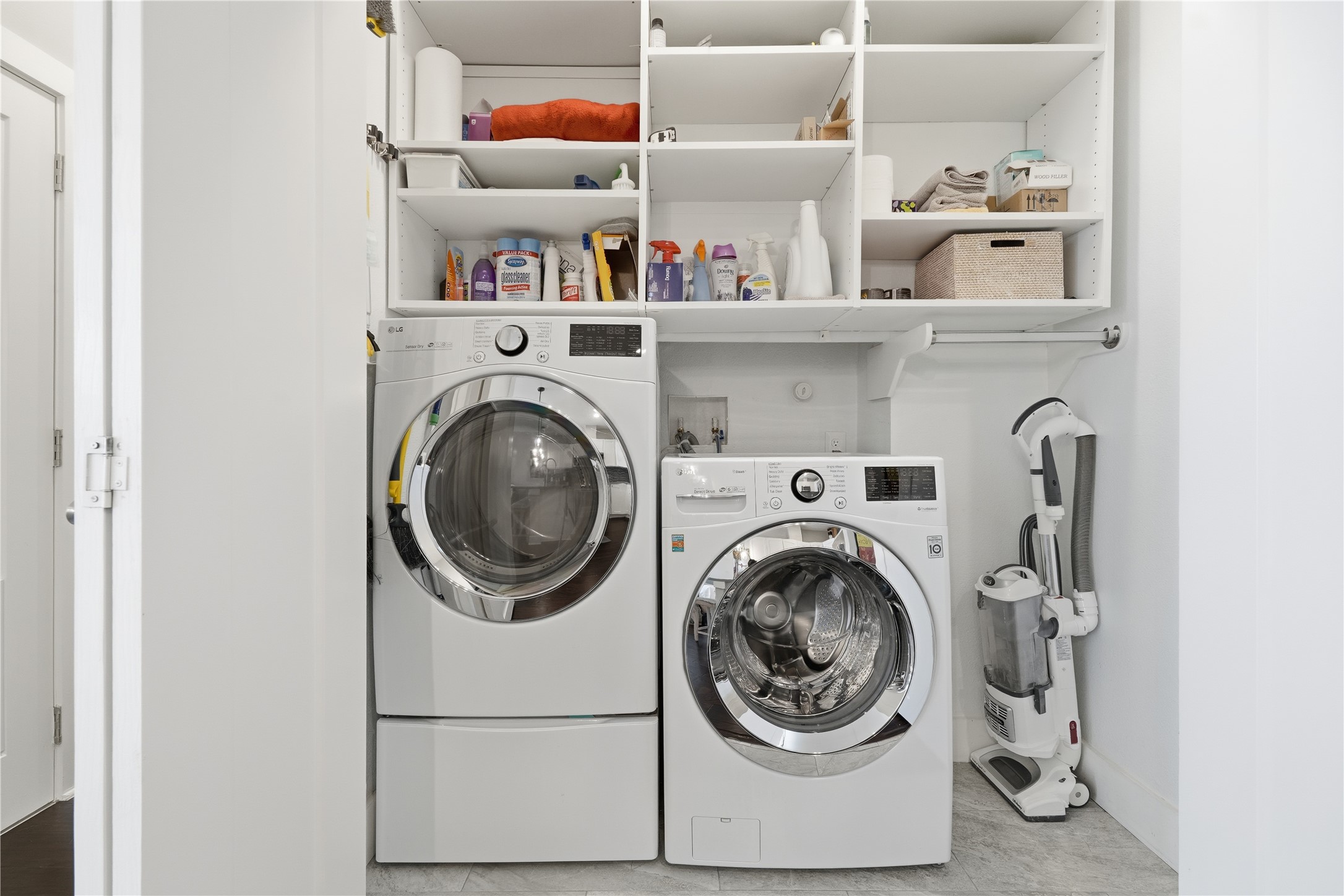 908 Nueces Street, Unit 31 Austin, TX 78701 - Photo 27 of 32 a utility room with dryer and washer