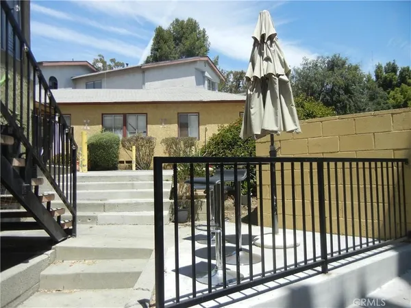 a front view of a house with a porch