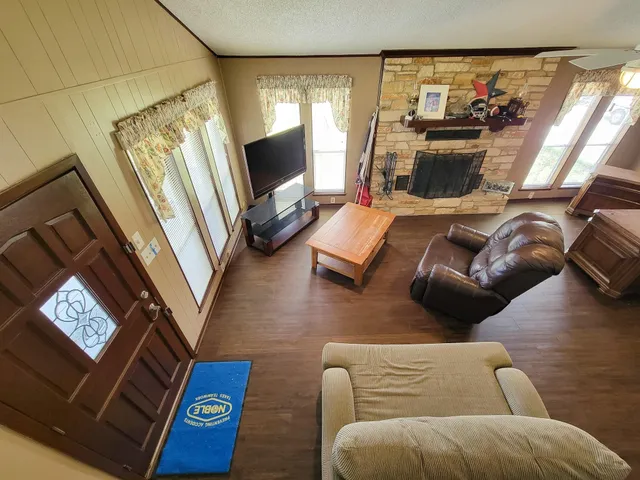 a view of a dining room with furniture and window