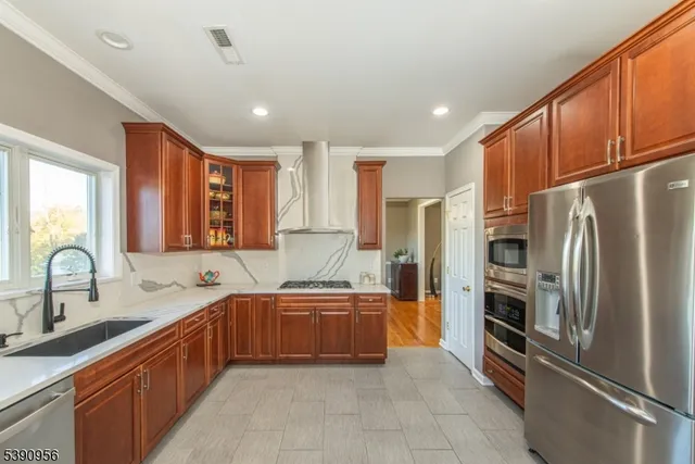 a close view of sink and cabinets