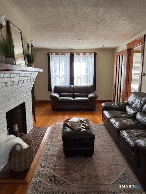 156 Mather Street Hamden, CT 06517 - Photo 12 of 31 beautiful hardwood flooring, warm, natural light. Sofa/loveseat/otoman included