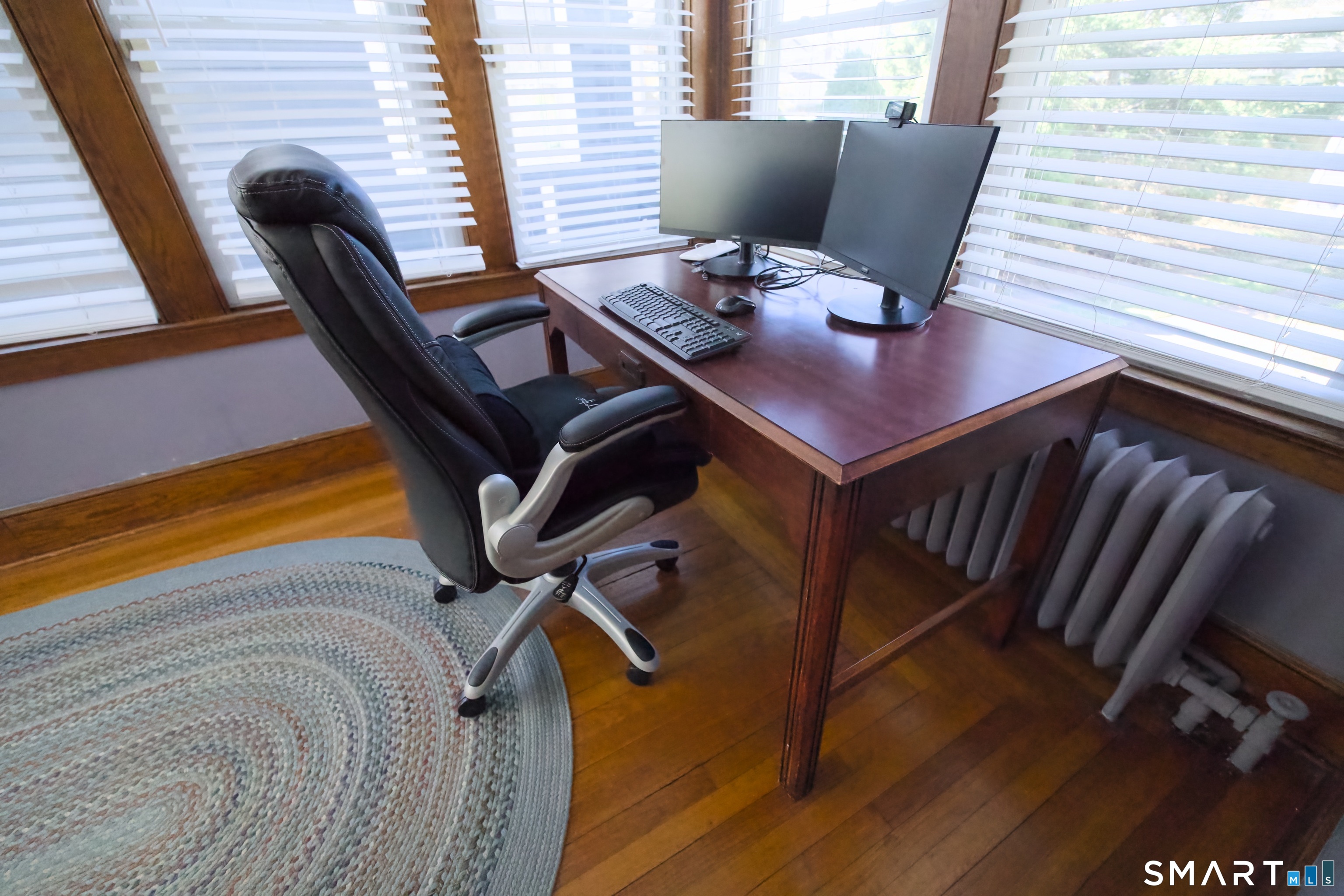 156 Mather Street Hamden, CT 06517 - Photo 17 of 31 Enjoy the warmth of this sunny sitting room. Enjoy morning coffee, or unwind at the end of the day. Can also be used as home office as shown.