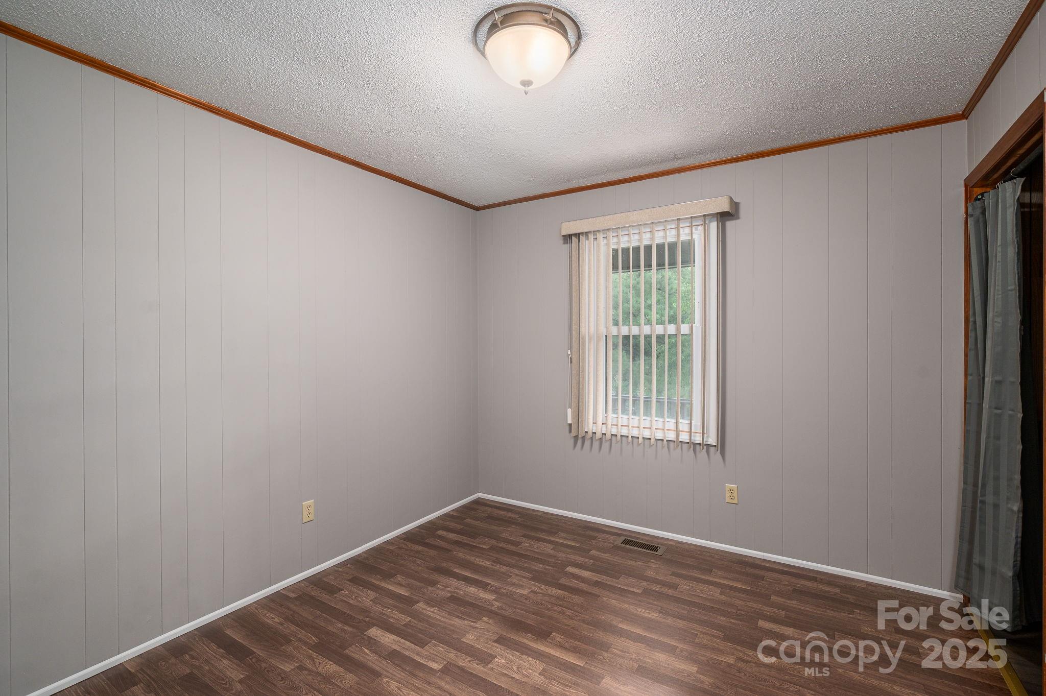 3076 Gates Road Lincolnton, NC 28092 - Photo 13 of 36 a view of empty room with wooden floor