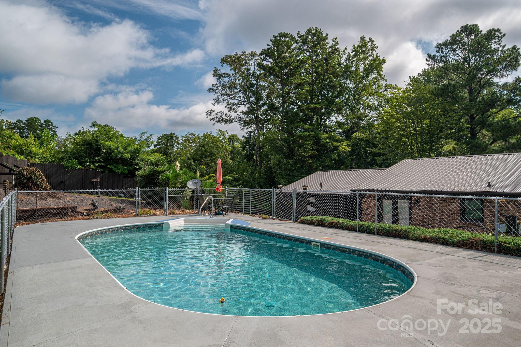 3076 Gates Road Lincolnton, NC 28092 - Photo 30 of 36 a view of a house with swimming pool and sitting area