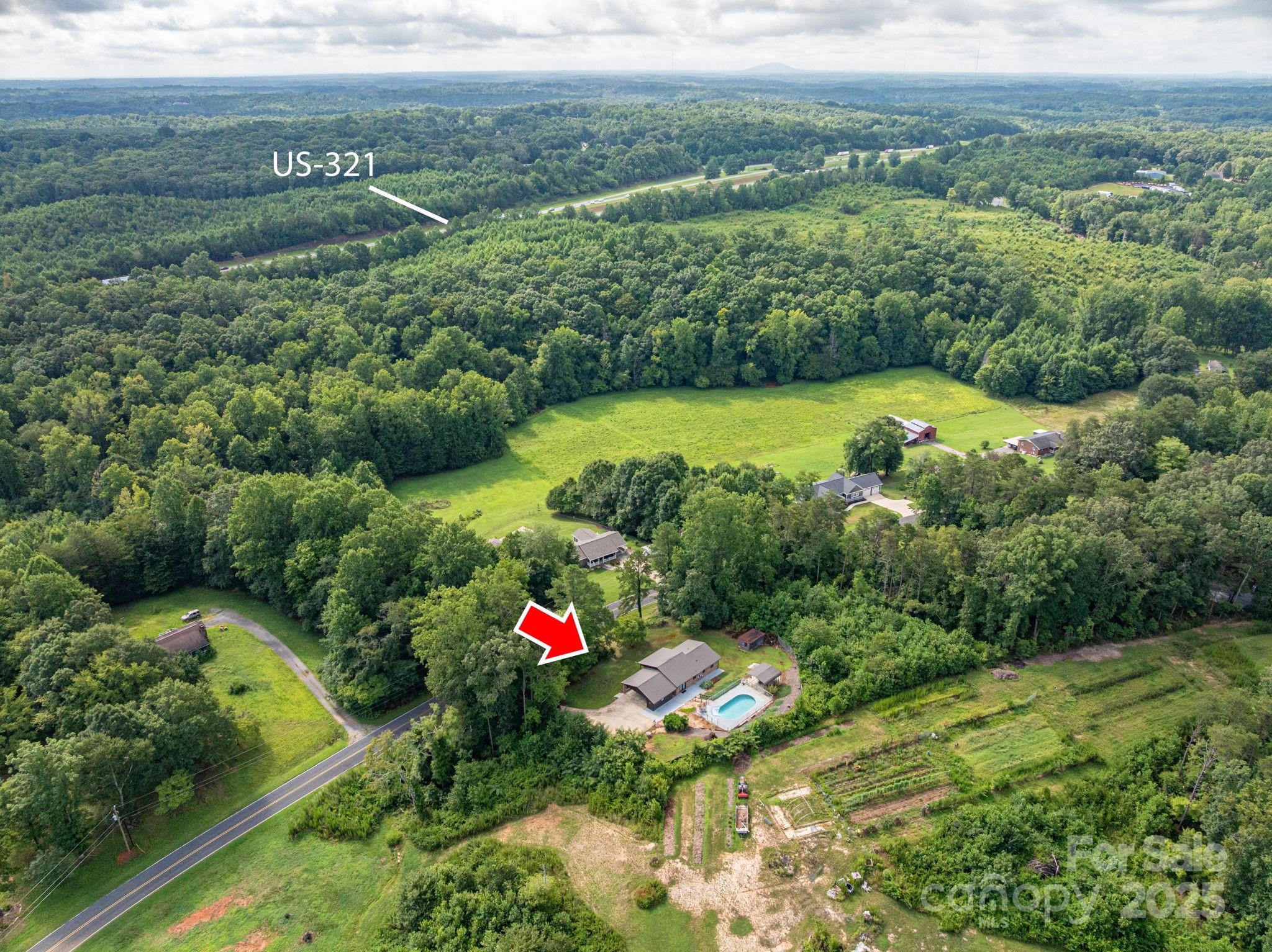 3076 Gates Road Lincolnton, NC 28092 - Photo 35 of 36 a view of a garden with an outdoor space
